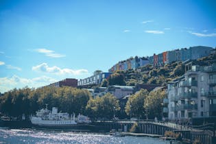 Scenic View of Houses by the River