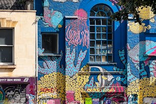Vibrant mural featuring sea creatures in Stokes Croft, Bristol, England.
